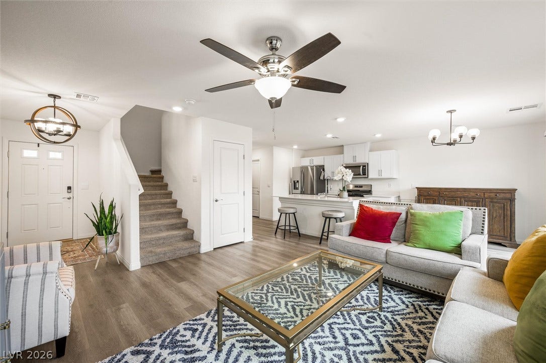 5651 Scarlet Rock Street, North Las Vegas, NV 89081 An open floorplan seamlessly connects the comfortable living area directly to the kitchen.