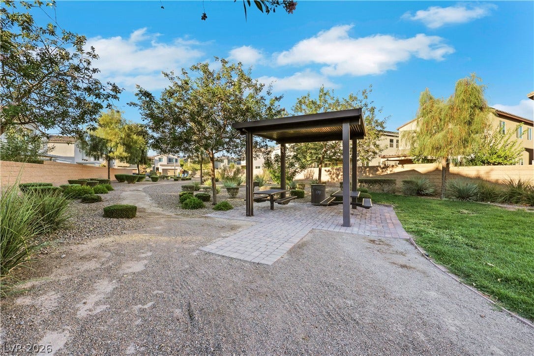 Spacious grassy community park just a walk distance away.