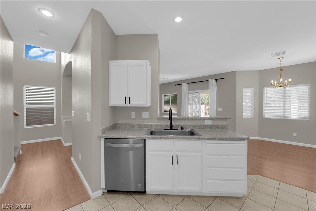 1158 Ekalaka Road, Henderson, NV 89052 Clean lines and multi-textured flooring define this airy open-concept layout.