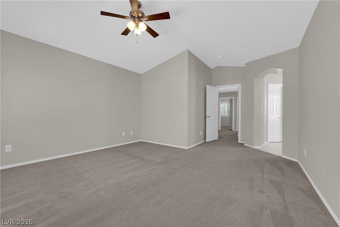 1158 Ekalaka Road, Henderson, NV 89052 Vaulted ceilings and soft plush carpeting define this versatile living space.