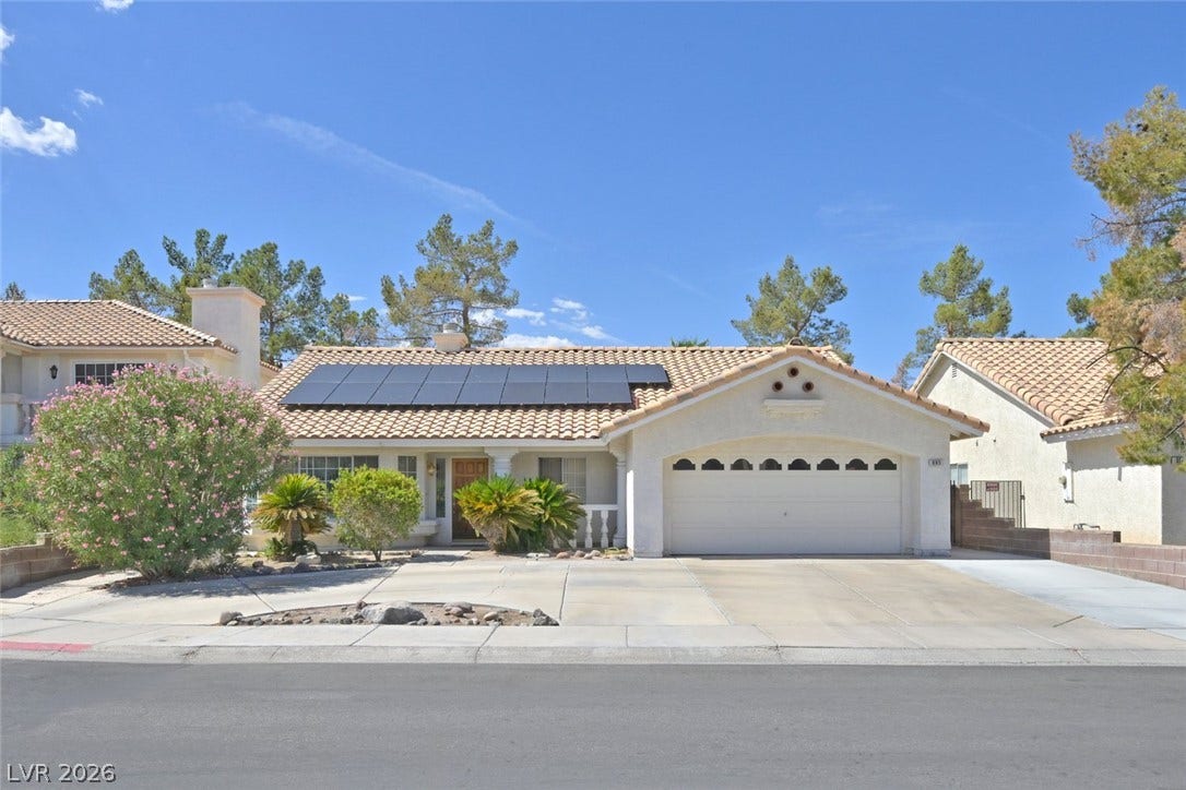 805 Stillwater Lane, Henderson, NV 89014 A classic tiled roof and integrated solar panels crown this single-story w/ 2 car garage.
