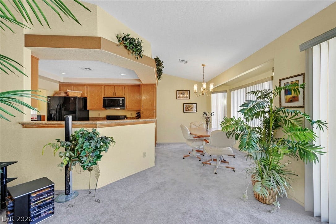805 Stillwater Lane, Henderson, NV 89014 comfortable dining space flowing seamlessly into the adjacent kitchen.