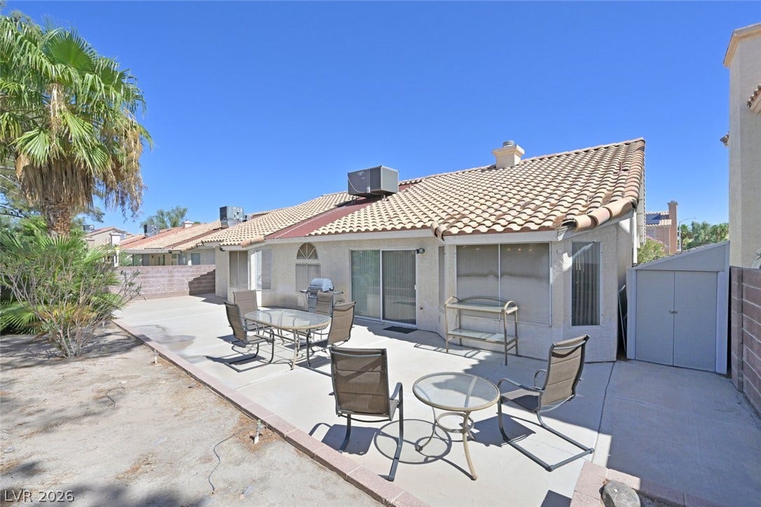 805 Stillwater Lane, Henderson, NV 89014 A spacious patio stretches across the rear of this stucco home. Shed included