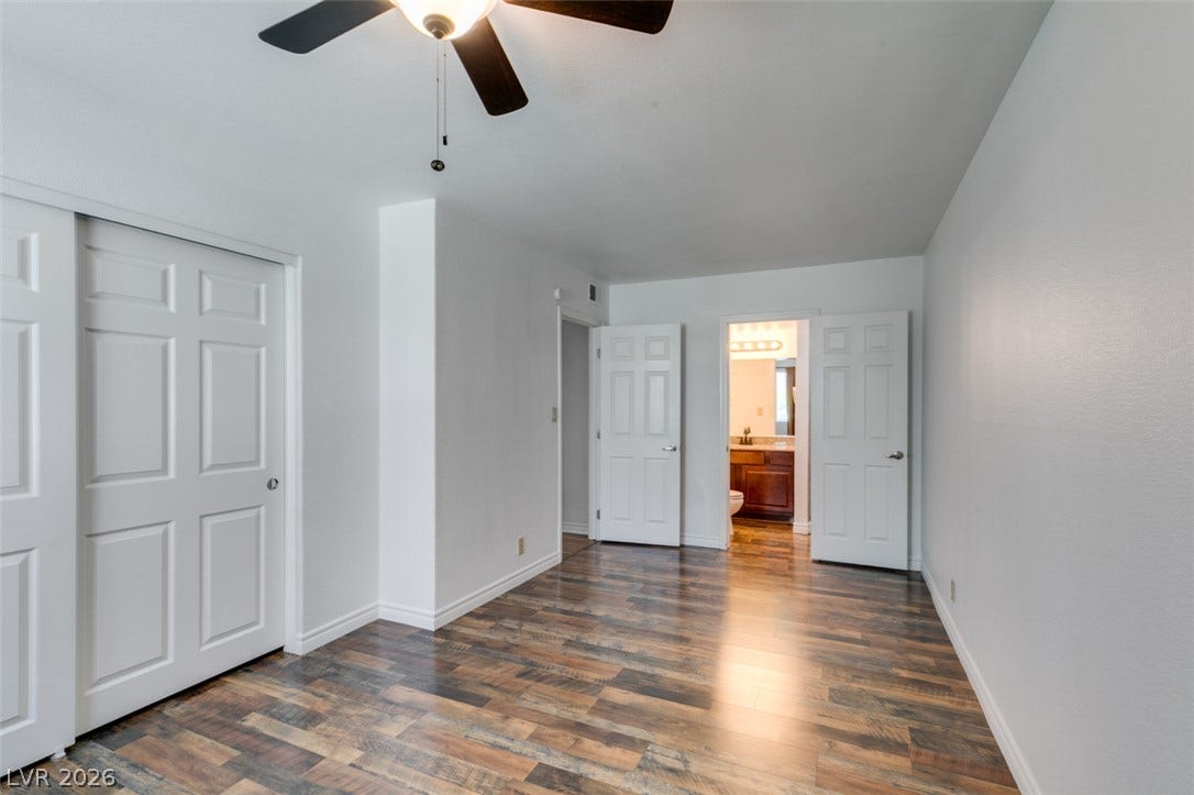 5240 Indian River Drive, #273, Las Vegas, NV 89103 Gleaming wood-look floors anchor a versatile space leading directly into an en suite bath.