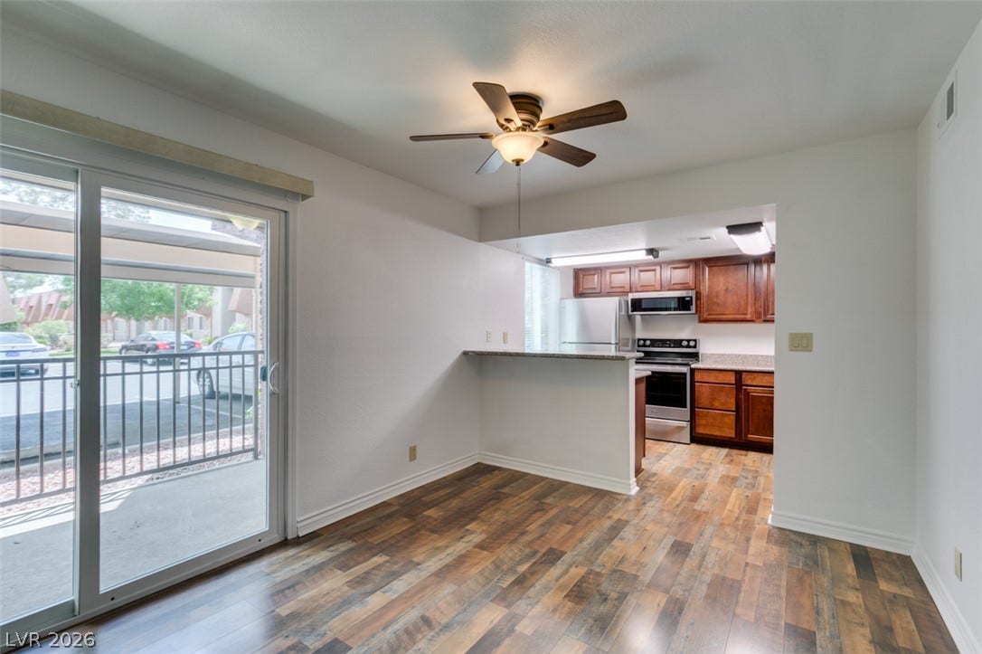 5240 Indian River Drive, #273, Las Vegas, NV 89103 Sliding glass doors open to a private patio from this open dining area.
