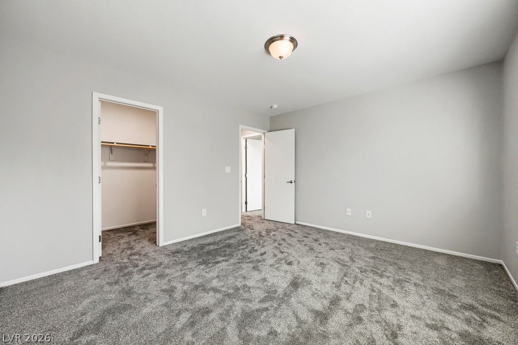 7241 Glistening Star Street, North Las Vegas, NV 89084 Plush wall-to-wall carpeting and neutral tones create a quiet, comfortable bedroom retreat.