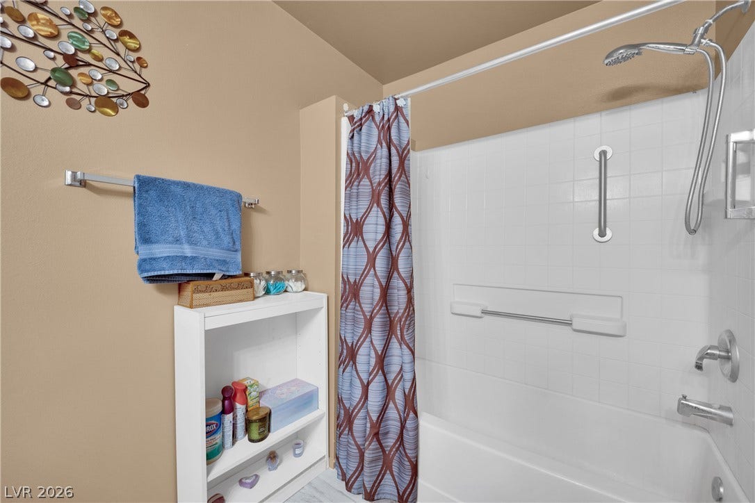 1520 Frank Aved Street, #201, Las Vegas, NV 89110 Clean lines and classic tile surround this tub and shower combination.