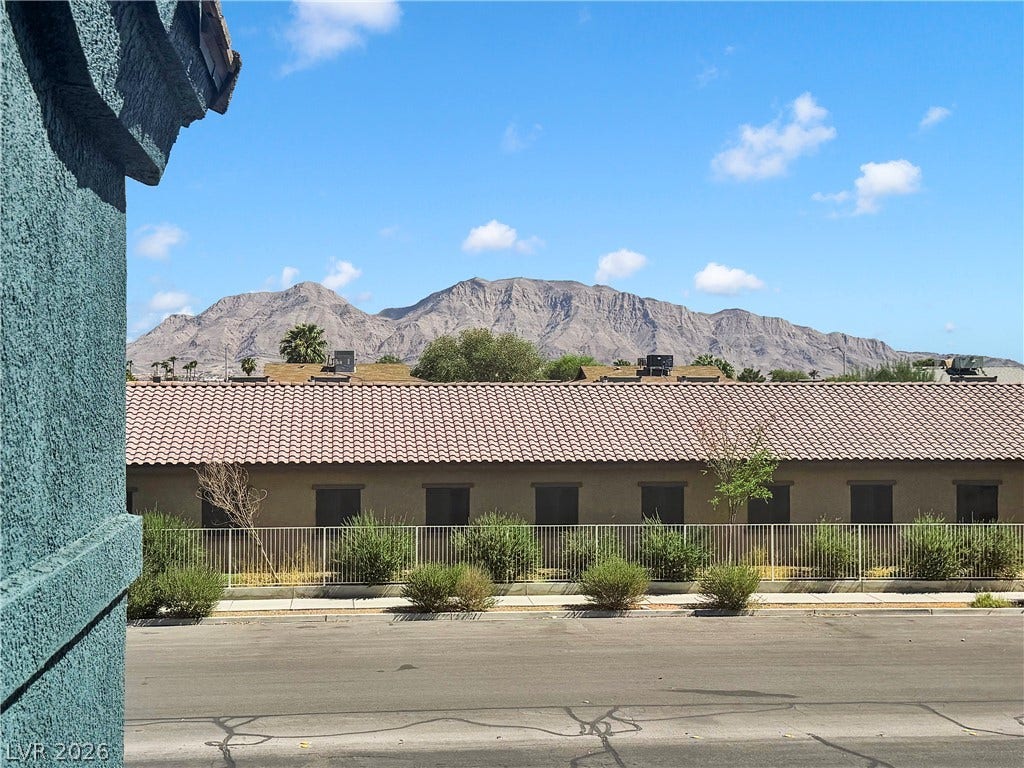 1520 Frank Aved Street, #201, Las Vegas, NV 89110 Dramatic mountain vistas rise above the tile roofs of the surrounding neighborhood.