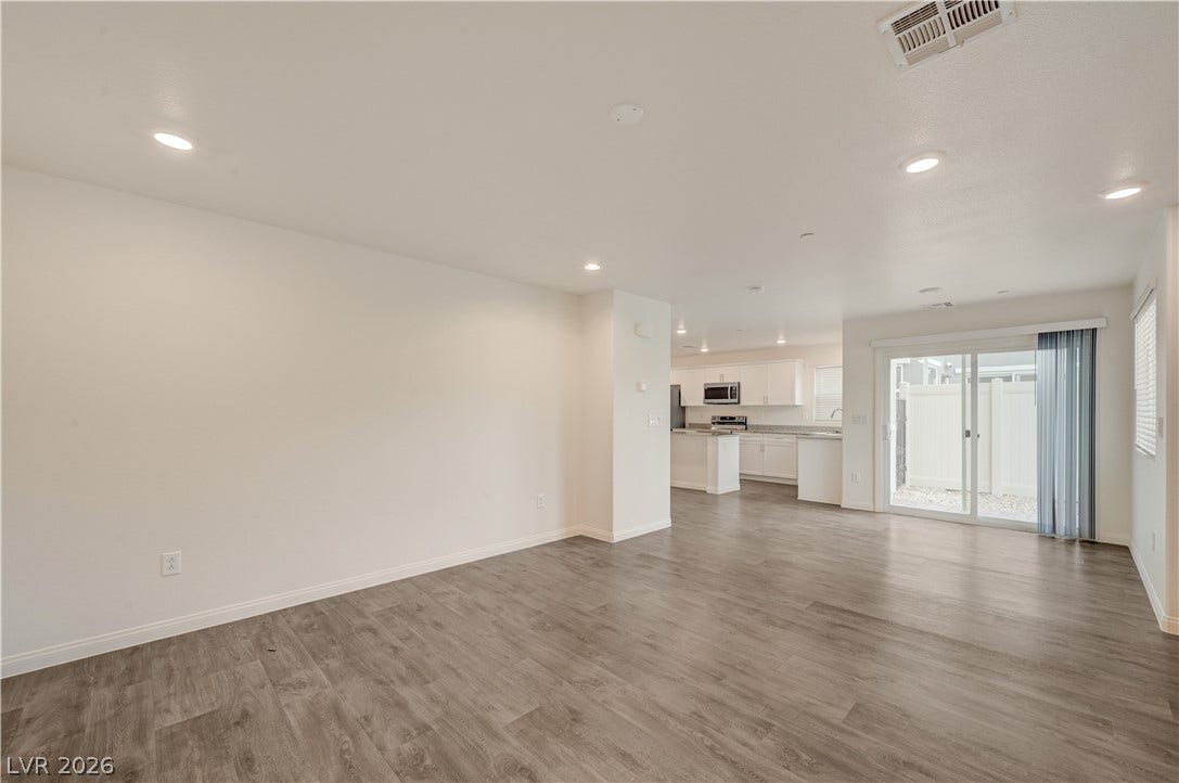 An open floor plan connects the main living space directly to the kitchen.
