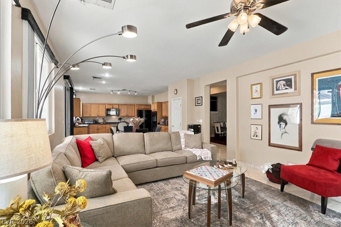 6329 Snow Cactus Street, North Las Vegas, NV 89031 An open floorplan seamlessly connects the comfortable living area directly to the kitchen.
