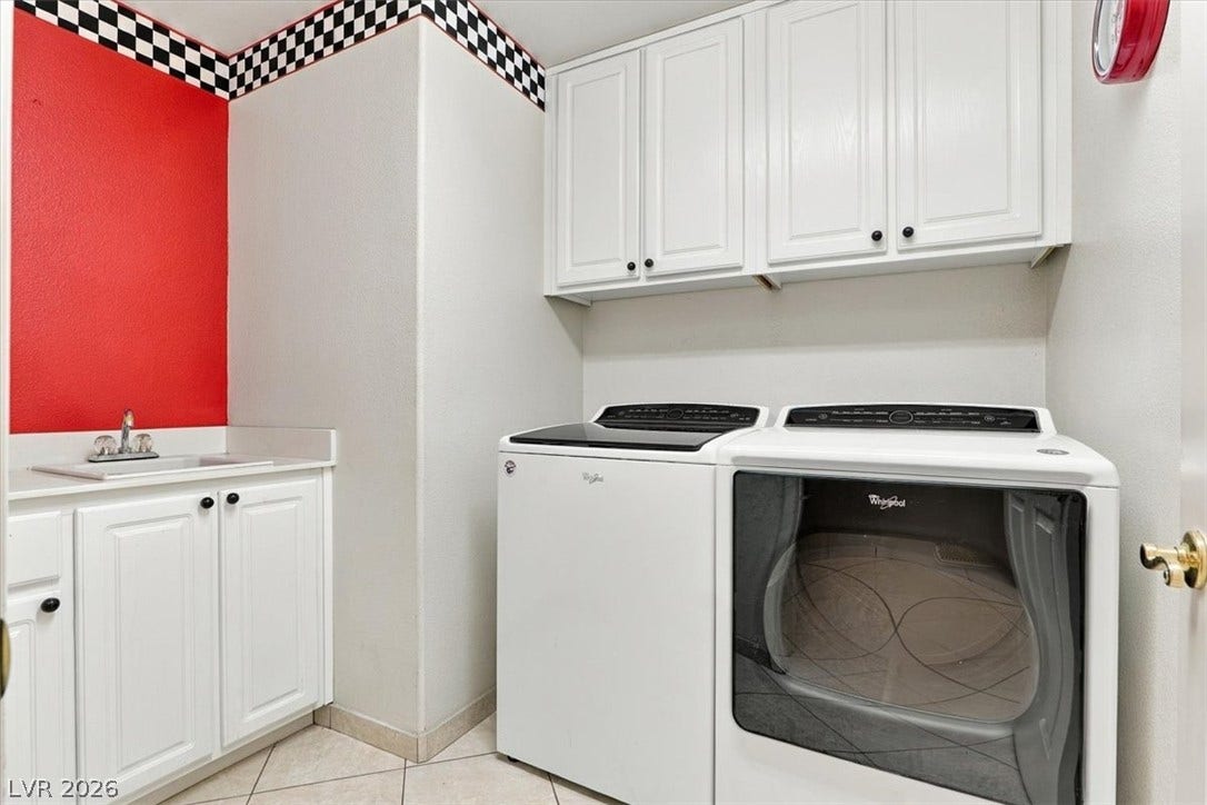 6329 Snow Cactus Street, North Las Vegas, NV 89031 Ample upper and lower cabinetry provides exceptional storage within this functional utility space.