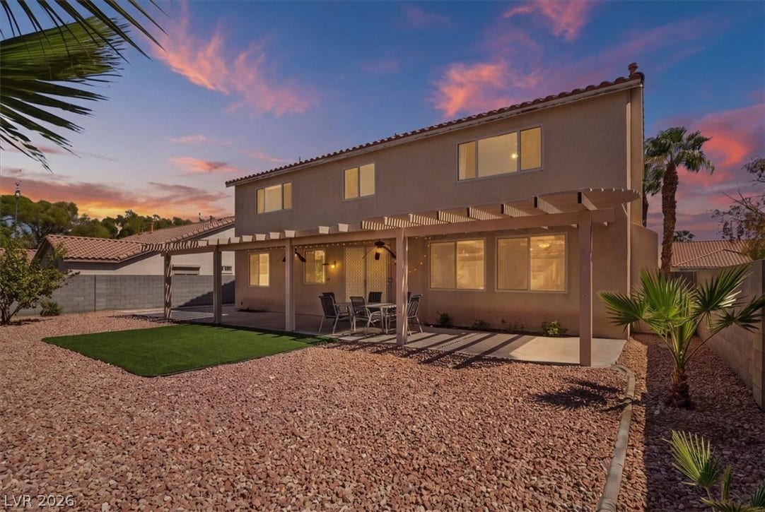 6329 Snow Cactus Street, North Las Vegas, NV 89031 A spacious covered patio anchors the low-maintenance desert backyard of this two-story home.