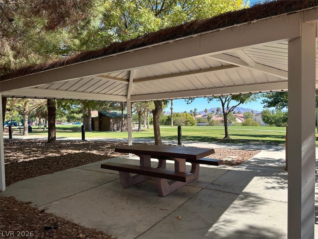 6329 Snow Cactus Street, North Las Vegas, NV 89031 Shaded pavilion overlooks a green community park under a clear sky.