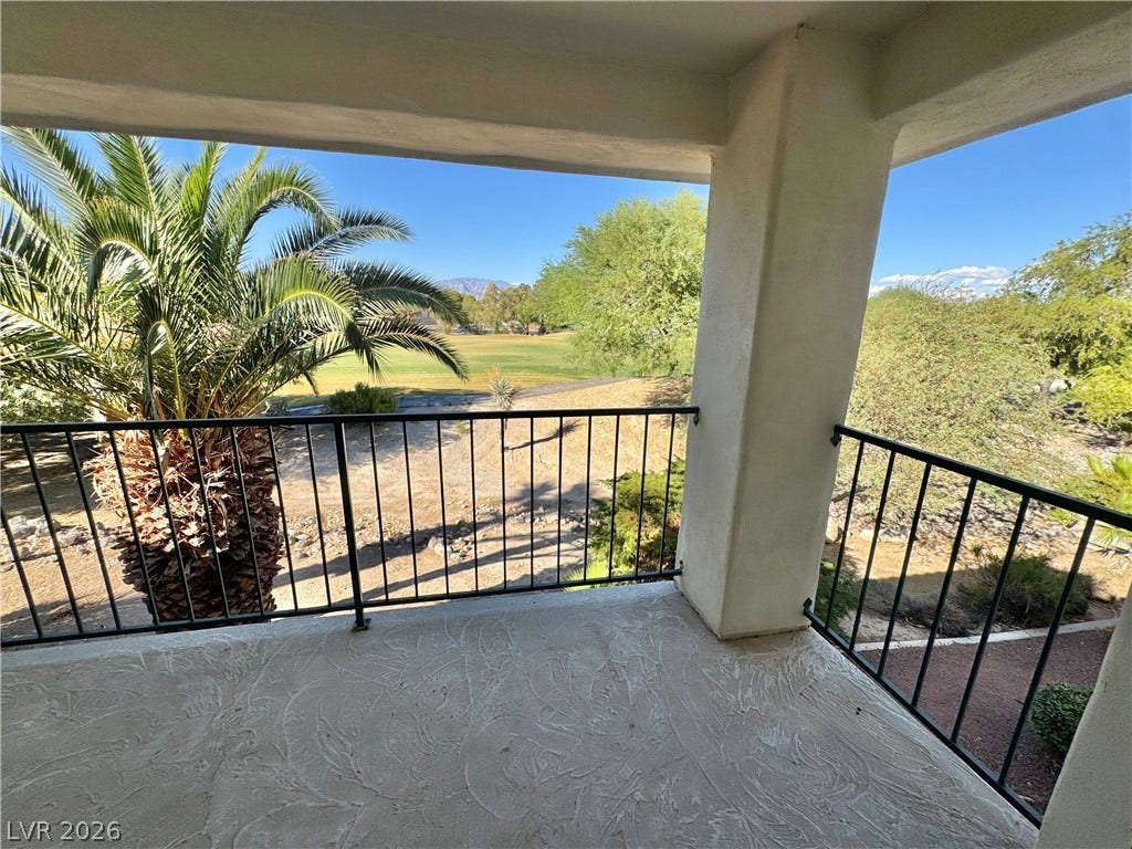 Balcony features sweeping views of the surrounding golf course.