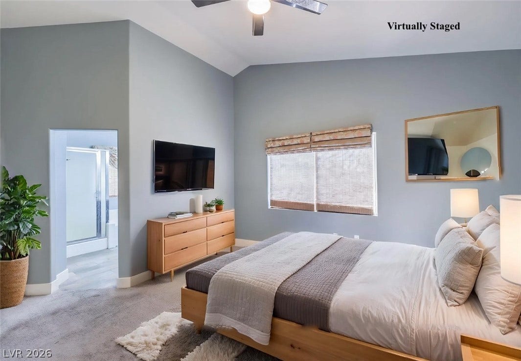 2421 Sunrise Springs Court, North Las Vegas, NV 89031 Vaulted ceilings and soft carpeting create a restful retreat opening directly to the bath.