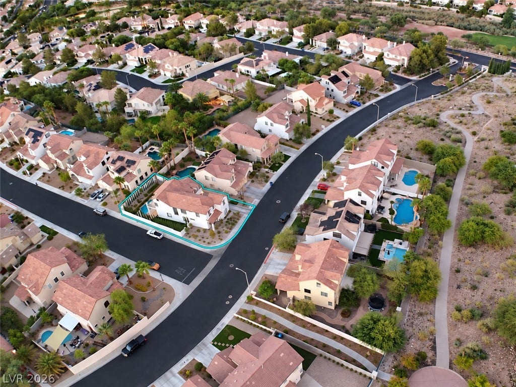 3018 Via Sarafina Drive, Henderson, NV 89052 An aerial view showcases a desirable corner lot nestled within a beautifully planned desert community.