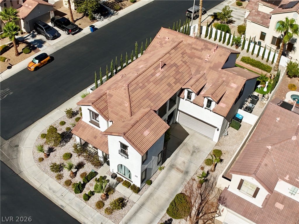 3018 Via Sarafina Drive, Henderson, NV 89052 An aerial perspective showcases the distinctive tile roof and low-maintenance desert landscaping of this property.