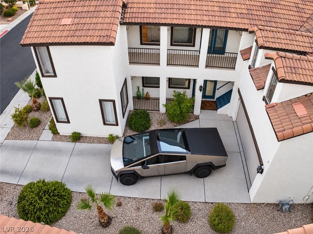 3018 Via Sarafina Drive, Henderson, NV 89052 Spanish tile roofing and pristine stucco walls frame this modern multi-level exterior entryway.