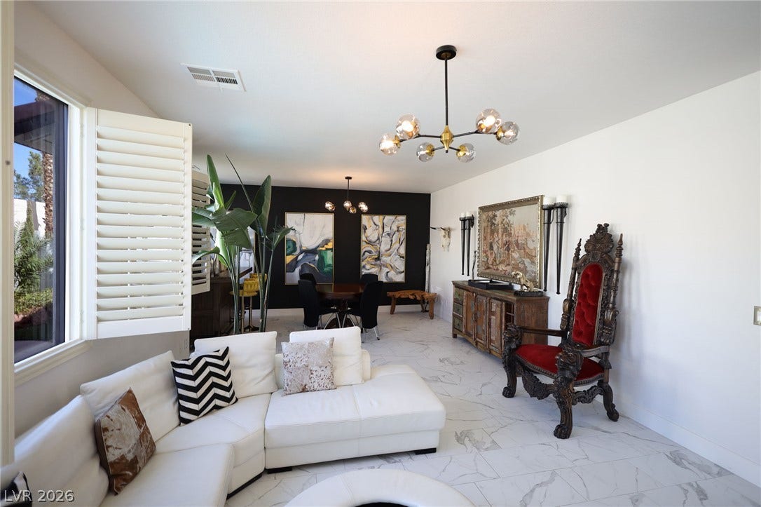 3018 Via Sarafina Drive, Henderson, NV 89052 Polished tile flooring and an open layout create a seamless flow through the living spaces.