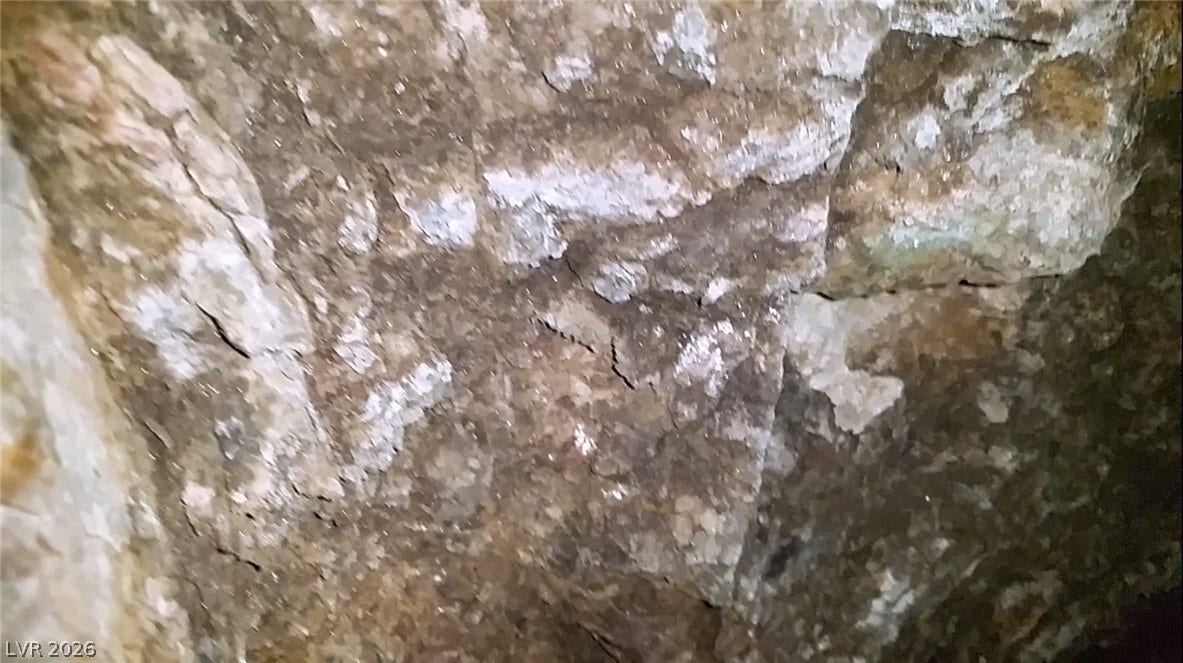 Aztec Wash Road - NPS 43, Nelson, NV 89046 View of mineral deposits within one of the horizontal mine shafts. NO TRESPASSING PER NRS 207.200. All tours must be with listing agent.