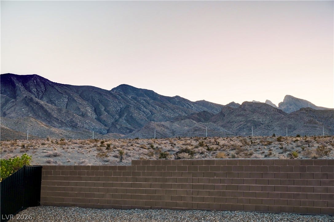 4709 Amazing View Street, Las Vegas, NV 89129 Dramatic mountain ranges rise majestically beyond the clean lines of a sturdy block retaining wall.