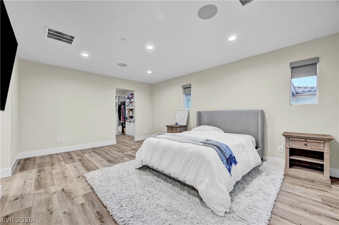4709 Amazing View Street, Las Vegas, NV 89129 Gleaming wood floors and modern recessed lighting define this peaceful retreat.