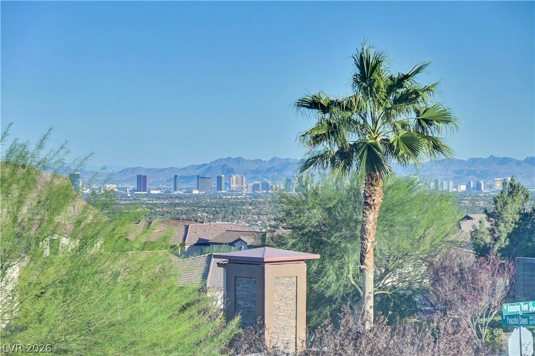 4709 Amazing View Street, Las Vegas, NV 89129 Panoramic mountain and skyline vistas create a picturesque backdrop for this desert landscape.