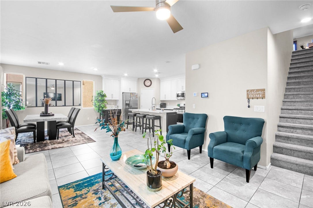 7224 Halo Falls Street, North Las Vegas, NV 89084 An open-concept design seamlessly connects the kitchen, dining, and living areas, creating a flowing and versatile space.