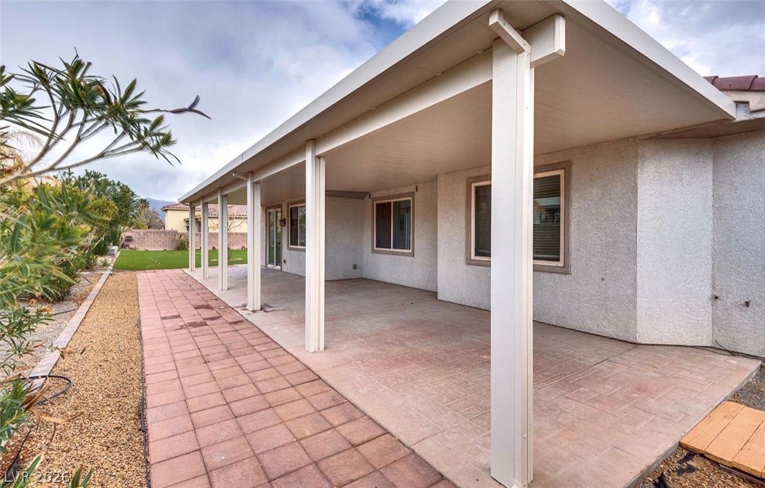 4709 Estate Ranch Street, North Las Vegas, NV 89031 An inviting covered patio offers ample space for outdoor enjoyment and relaxation.