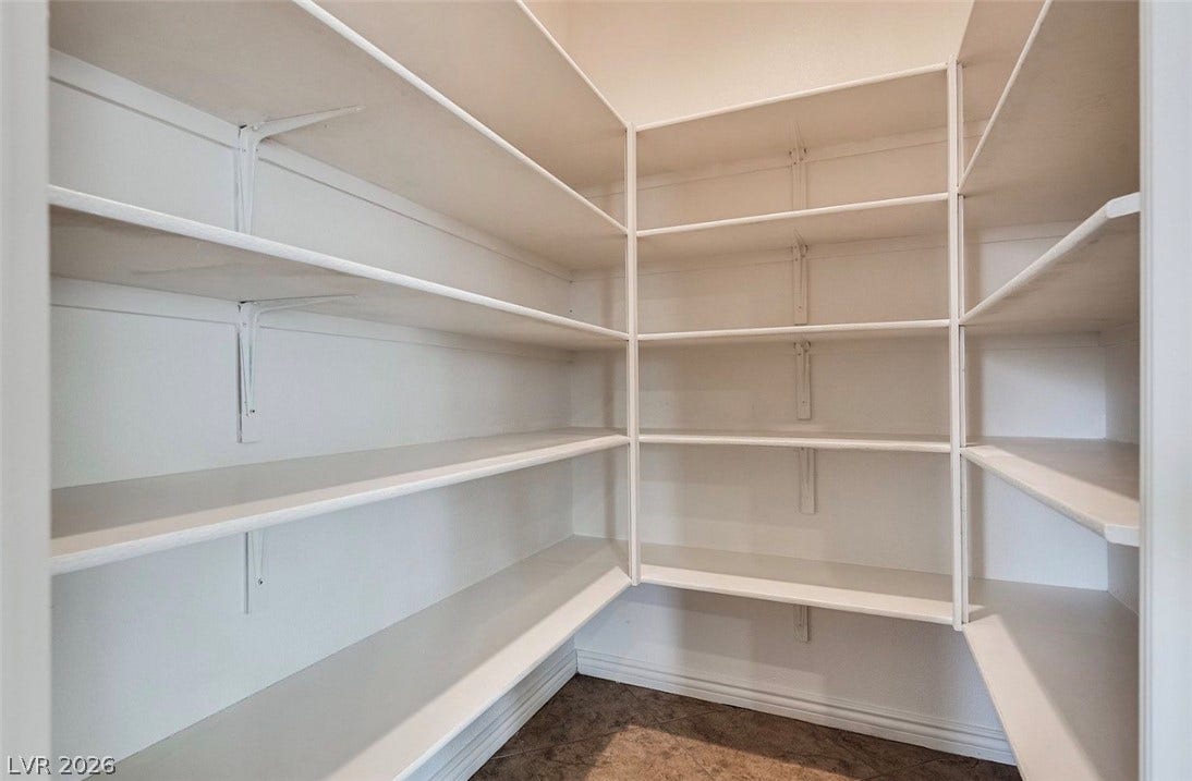 4709 Estate Ranch Street, North Las Vegas, NV 89031 Ample built-in shelving provides abundant storage for all household essentials.