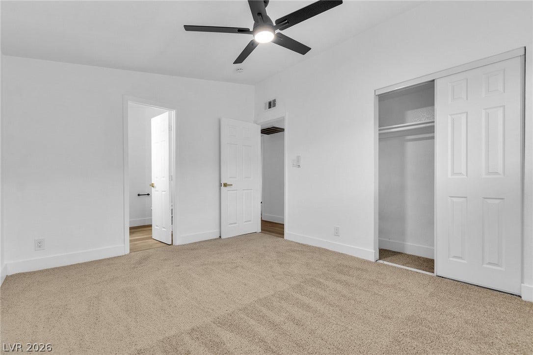 1604 Basswood Avenue, North Las Vegas, NV 89030 Plush carpeting and clean walls define this comfortable bedroom layout.