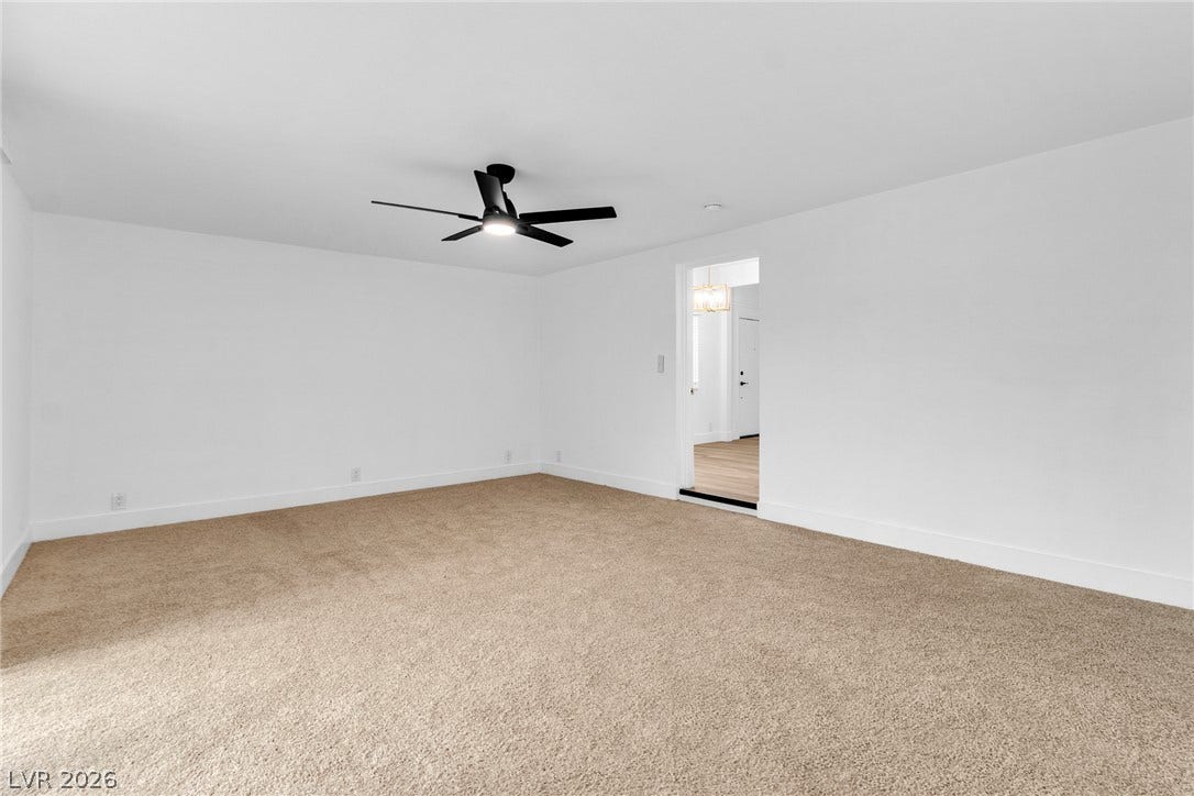 1604 Basswood Avenue, North Las Vegas, NV 89030 Clean lines and soft carpeting define this versatile living space.