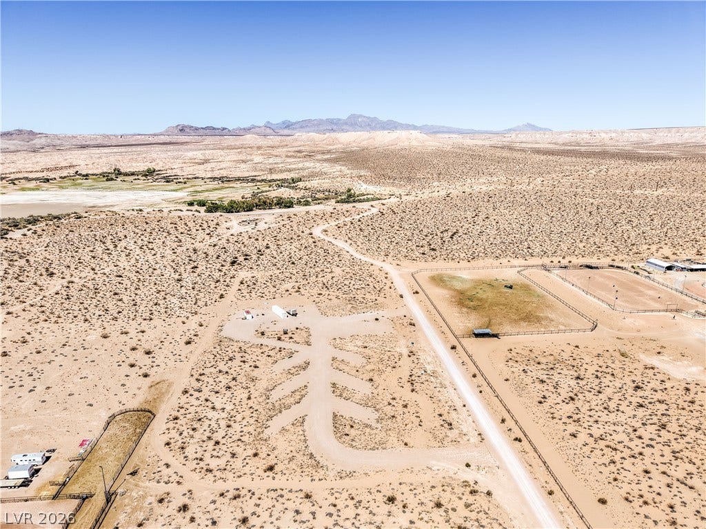 Skyline, Logandale, NV 89021 Vast desert acreage offers expansive mountain views and dedicated equestrian spaces under clear open skies.