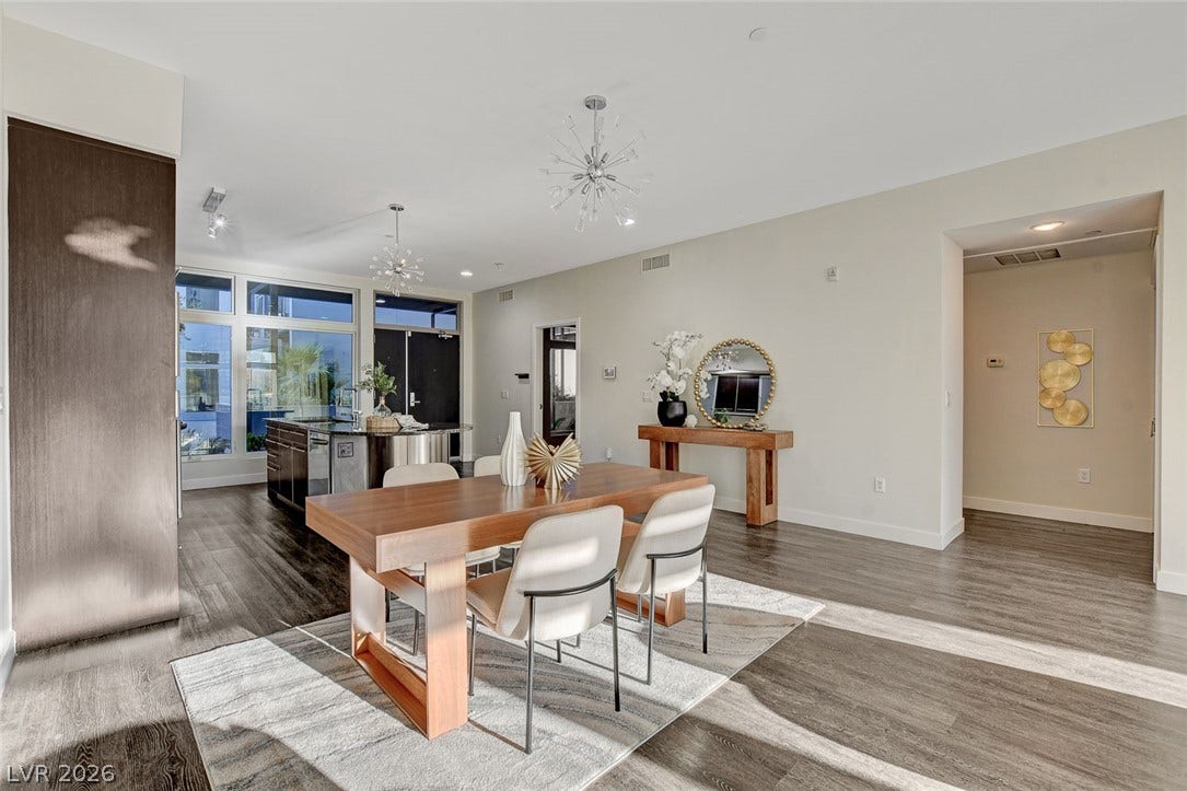 8925 W Flamingo Road, #111, Las Vegas, NV 89147 Gleaming hardwood floors and a spacious open layout define this modern dining and living space.
