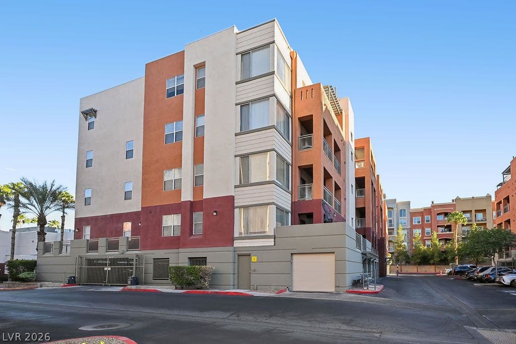 47 E Agate Avenue, #301, Las Vegas, NV 89123 Clean architectural lines define this multi-story exterior showcasing gated ground-level access.