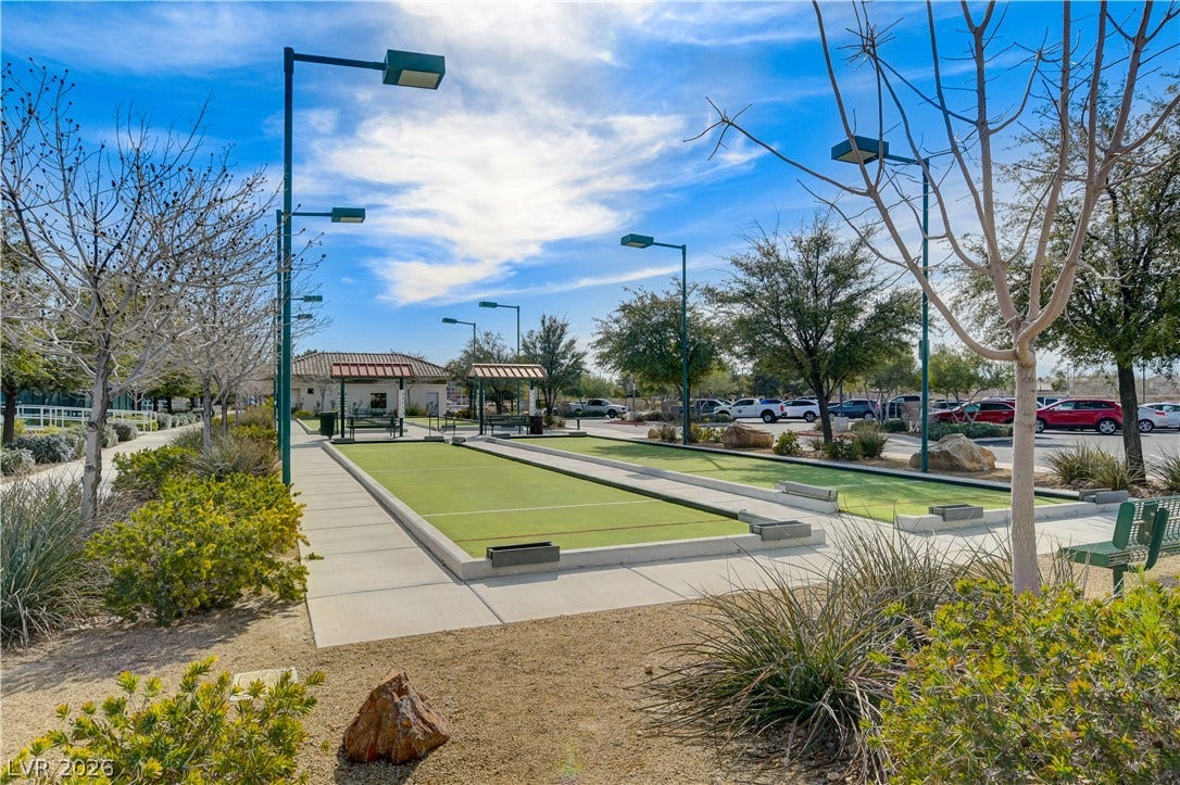 2612 Rock Pigeon Avenue, North Las Vegas, NV 89084 Exemplary outdoor recreation courts stand surrounded by manicured pathways and desert landscaping.