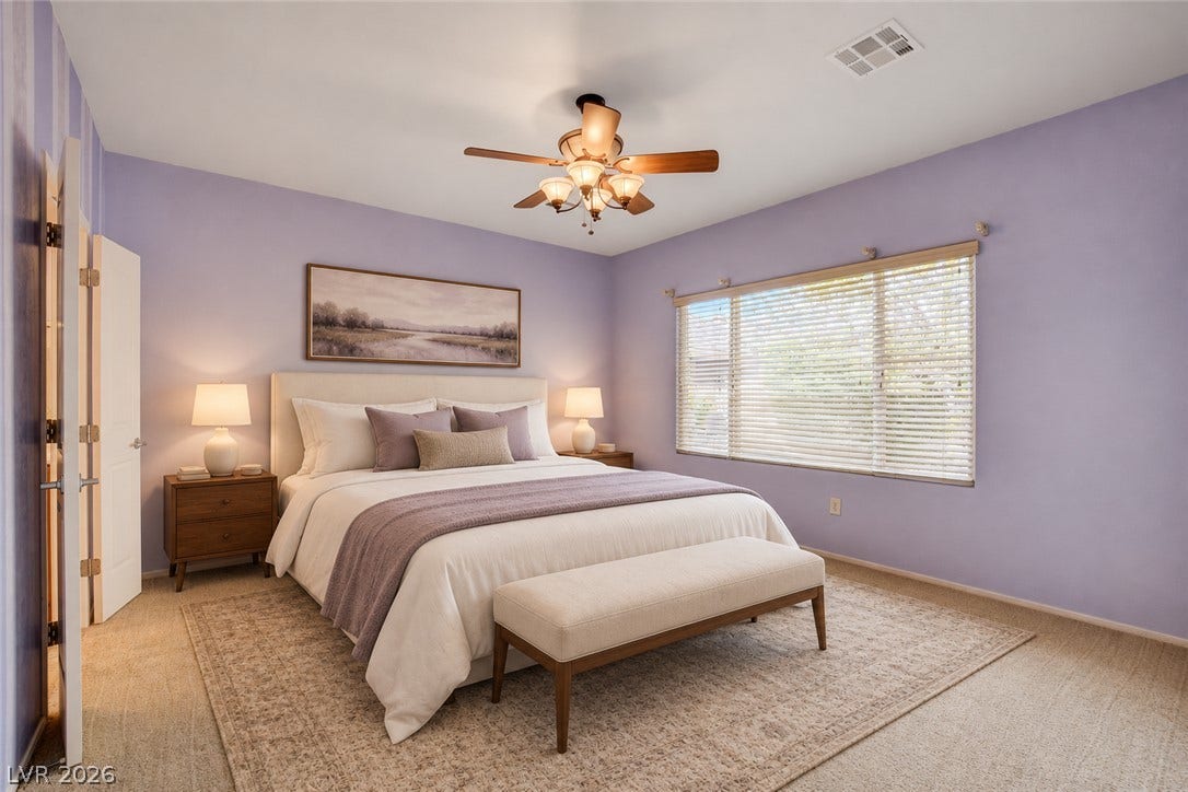 2612 Rock Pigeon Avenue, North Las Vegas, NV 89084 Plentiful natural light streams through wide windows over soft carpet in this inviting bedroom. Virtually Staged