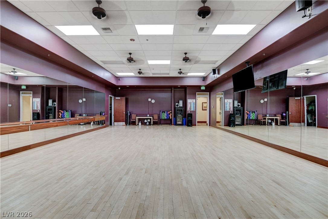 2612 Rock Pigeon Avenue, North Las Vegas, NV 89084 Polished hardwood floors and mirrored walls define this spacious professional exercise studio.