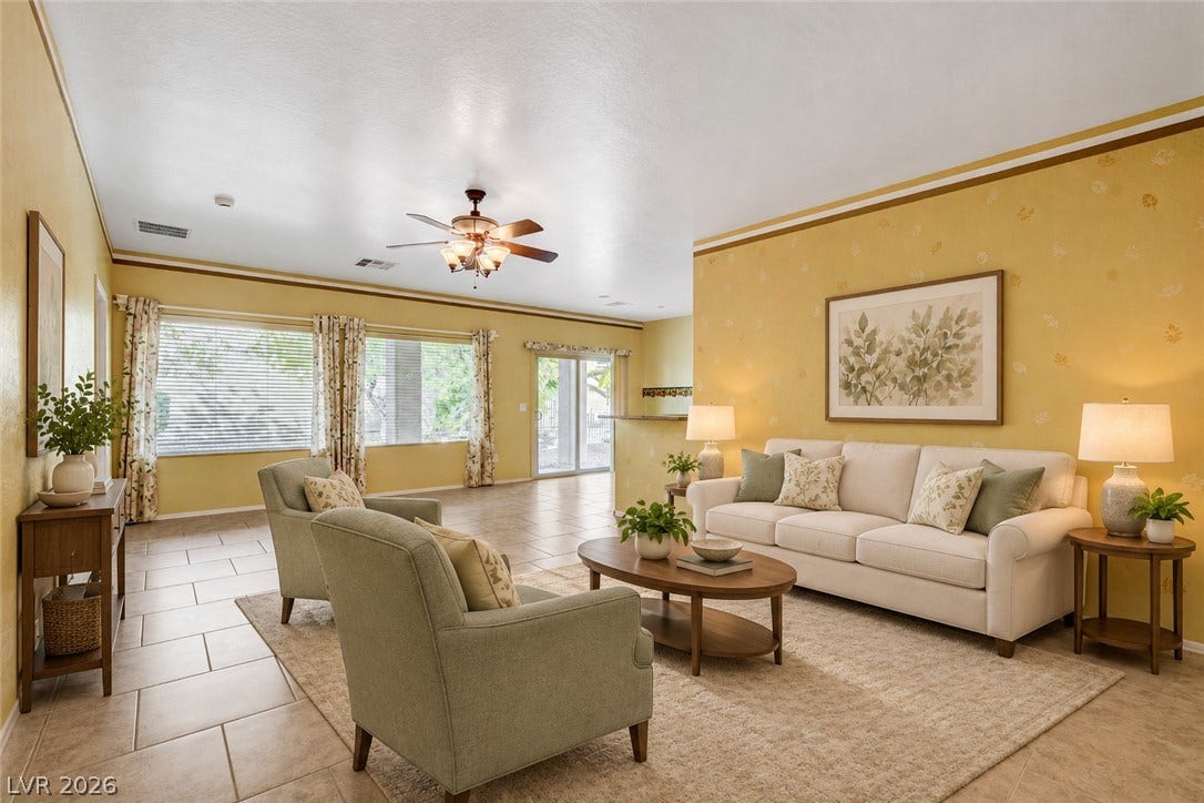 2612 Rock Pigeon Avenue, North Las Vegas, NV 89084 Tile flooring and an open layout create a seamless flow through this living space. Virtually Staged