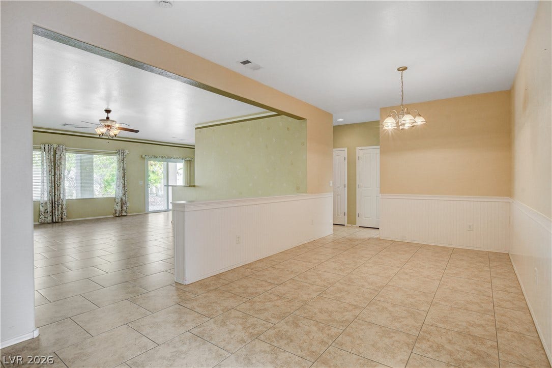 2612 Rock Pigeon Avenue, North Las Vegas, NV 89084 An open floorplan flows seamlessly from the dining area into the living spaces.