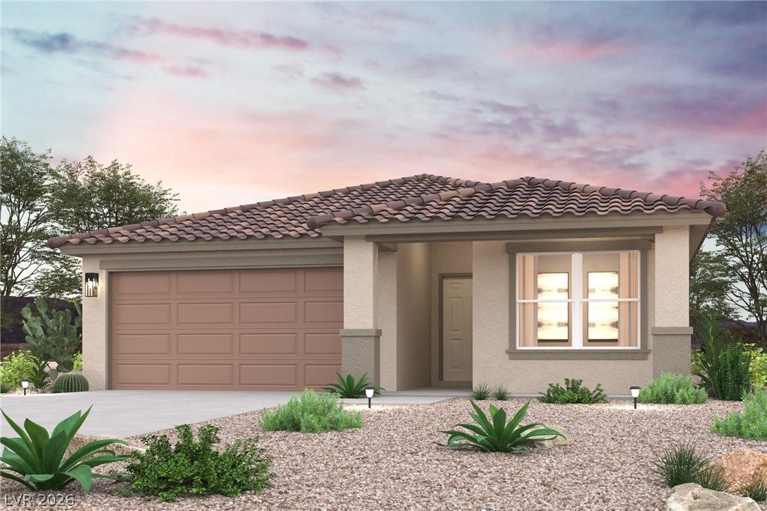 Desert landscaping and a tiled roof enhance the curb appeal of this modern single-story home.