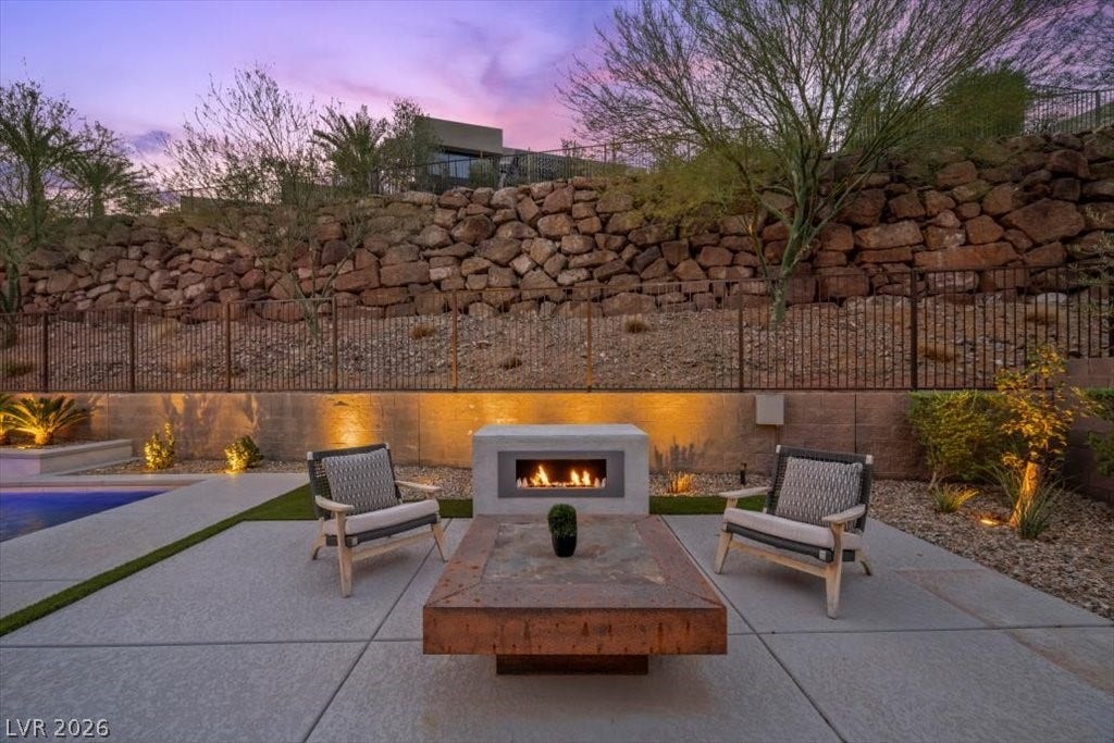 5 HIGHLAND COVE Lane, Henderson, NV 89011 An inviting outdoor patio offers a perfect setting for evenings under the open sky.