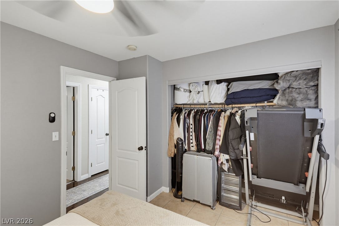 3211 Panamint Court, North Las Vegas, NV 89032 An open reach-in closet reveals storage space adjacent to tile flooring.