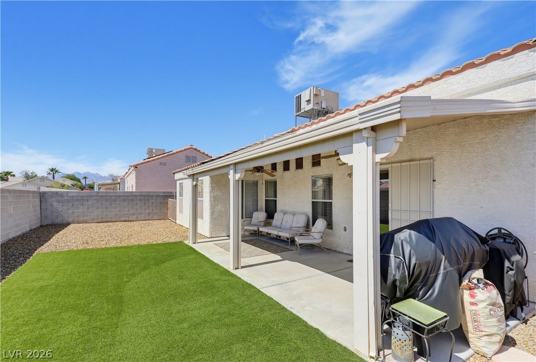 3211 Panamint Court, North Las Vegas, NV 89032 An inviting covered patio overlooks the manicured lawn and private walled backyard.