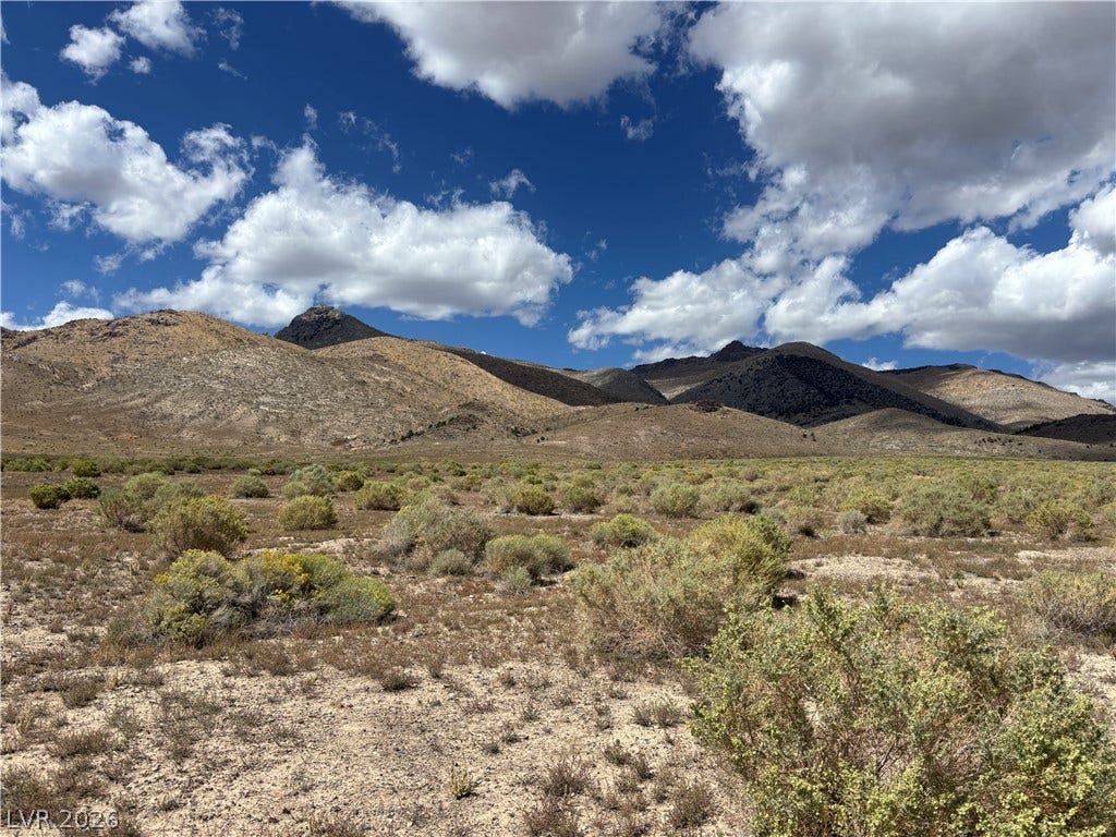 WP Co. WP Co. Road 31 (N. Spring Valley Rd), Ely, NV 89301 Rugged ridges rise sharply against a deep blue sky over this wild desert landscape.