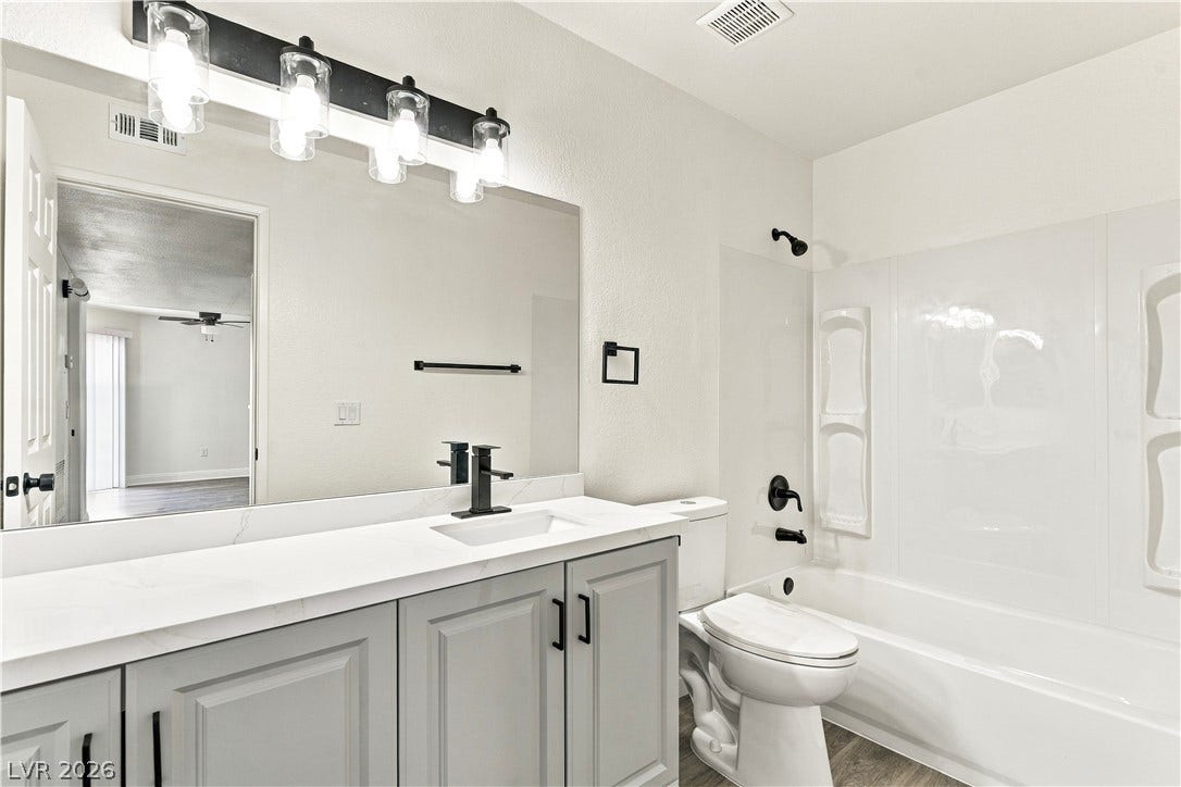 6800 Lake Mead, #2117, Las Vegas, NV 89156 Clean lines and a spacious vanity define this modern bathroom space.