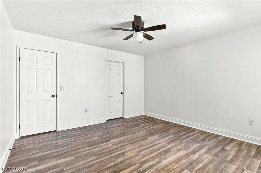 6800 Lake Mead, #2117, Las Vegas, NV 89156 Smooth wood-style flooring anchors this versatile space, ready for your personal design touch.
