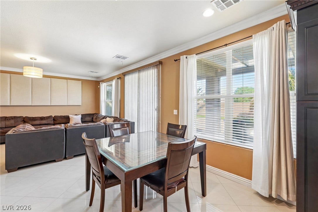 4024 Solar System Street, North Las Vegas, NV 89032 Tiled flooring and crown molding accent this open-concept layout leading directly into the living space.