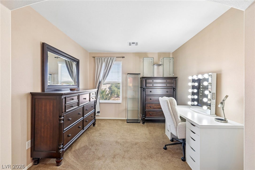 4024 Solar System Street, North Las Vegas, NV 89032 Soft carpeting underfoot defines this comfortable room layout complete with a window overlooking the neighborhood.