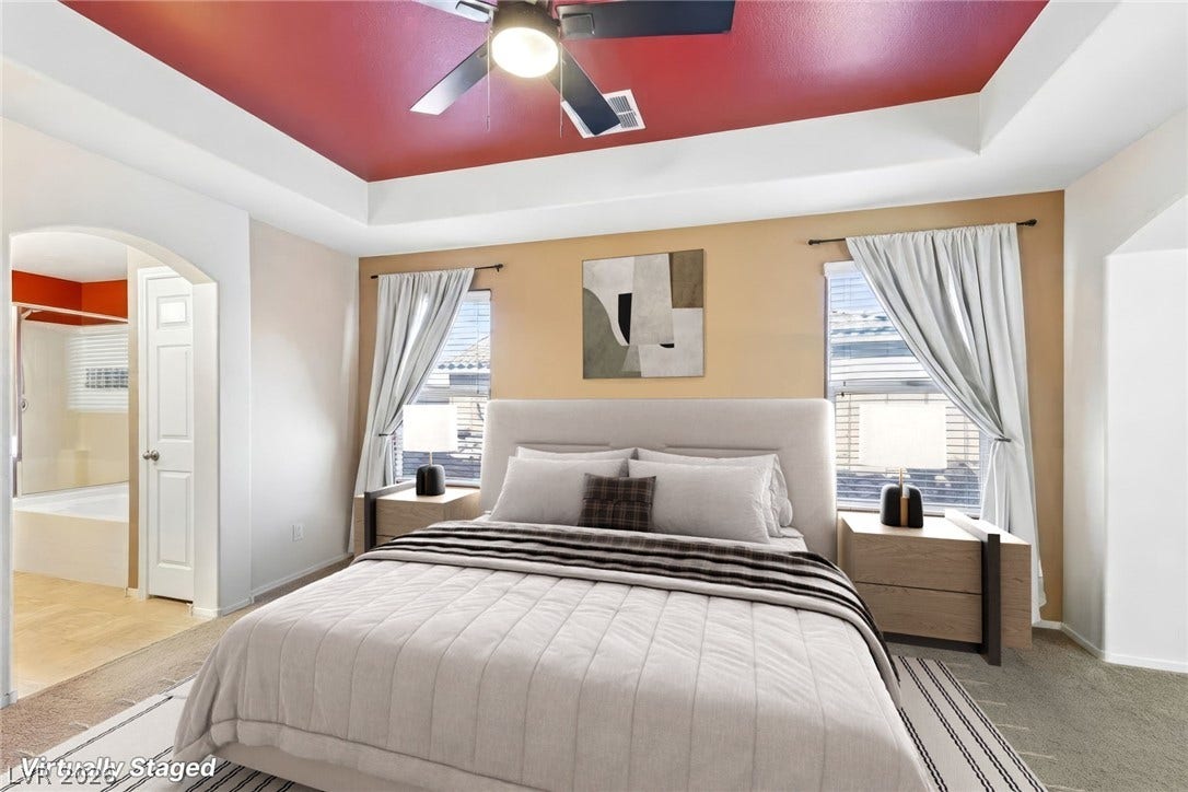 4024 Solar System Street, North Las Vegas, NV 89032 An elegant tray ceiling with custom inset detailing anchors this comfortable primary suite.